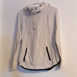 Woman’s Athleta size Med, cowl neck hoodie, grey with black piping.